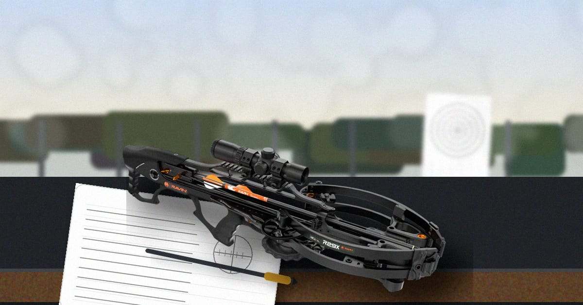 Ravin R29X crossbow on a bench at the range with a target set for sight-in and notes for scope reticles