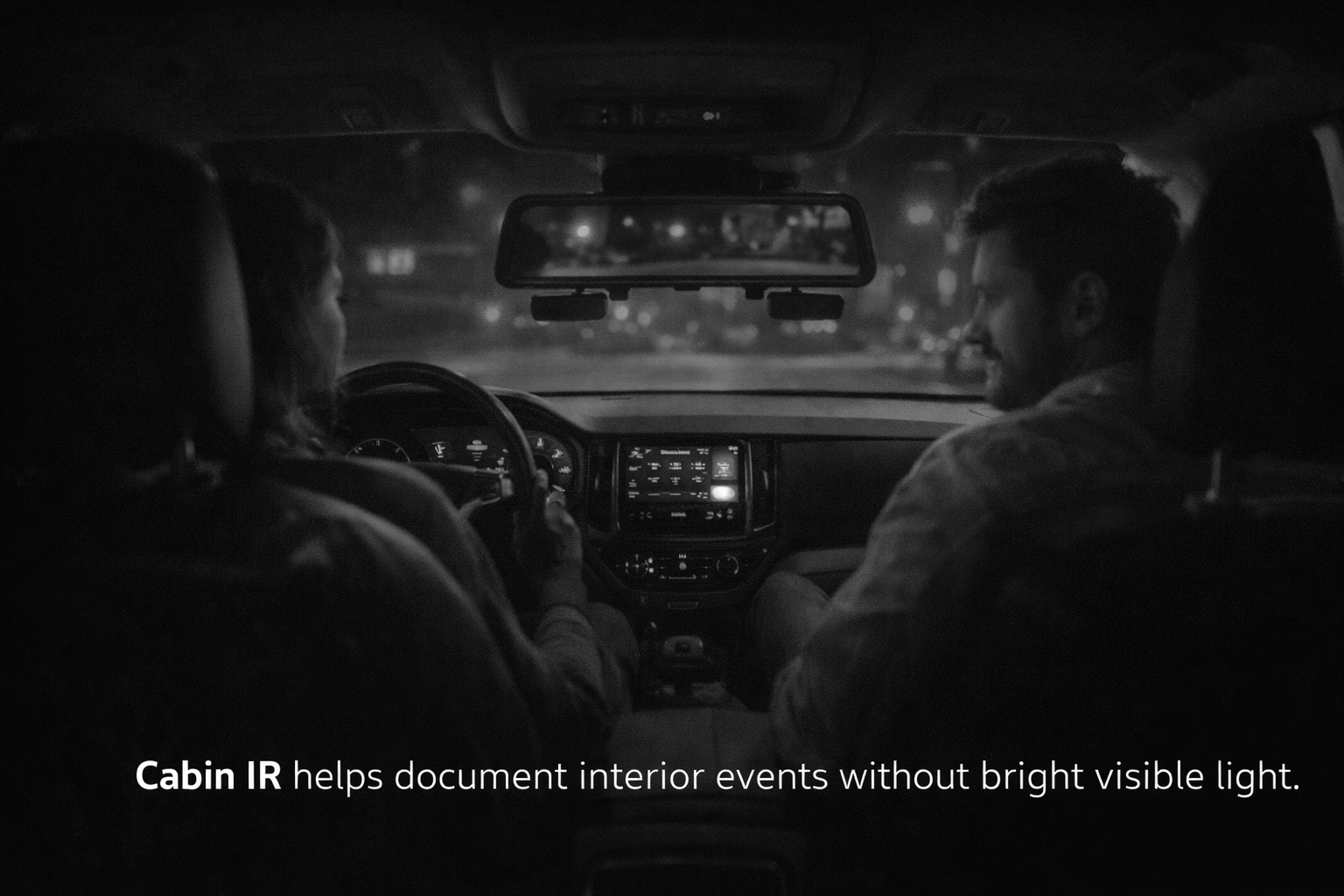 Night interior view showing IR-assisted cabin recording for a mirror dash cam system like the Rexing M4 mirror dashcam