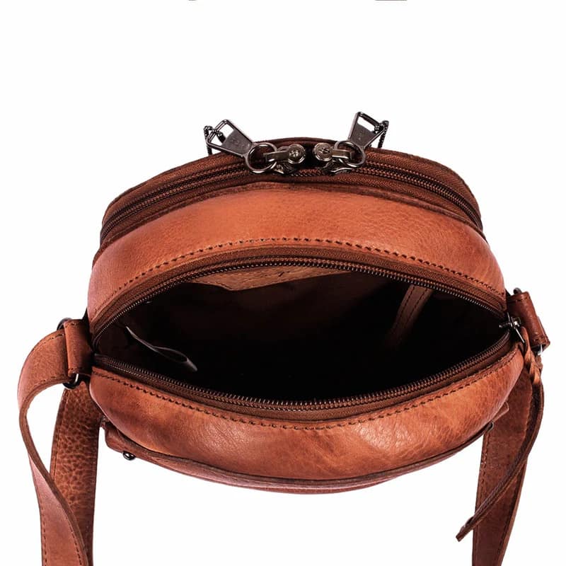 Interior of Lady Conceal Mia crossbody purse in Blush showing pockets and key strap