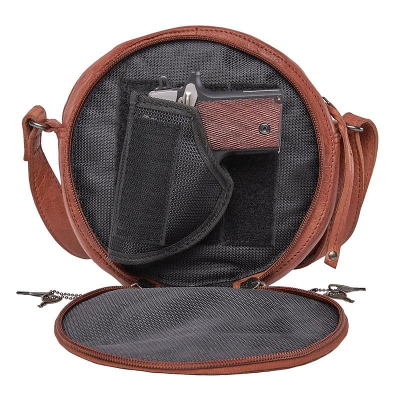 Lady Conceal Mia concealment pocket open showing Velcro panel and universal holster with small handgun